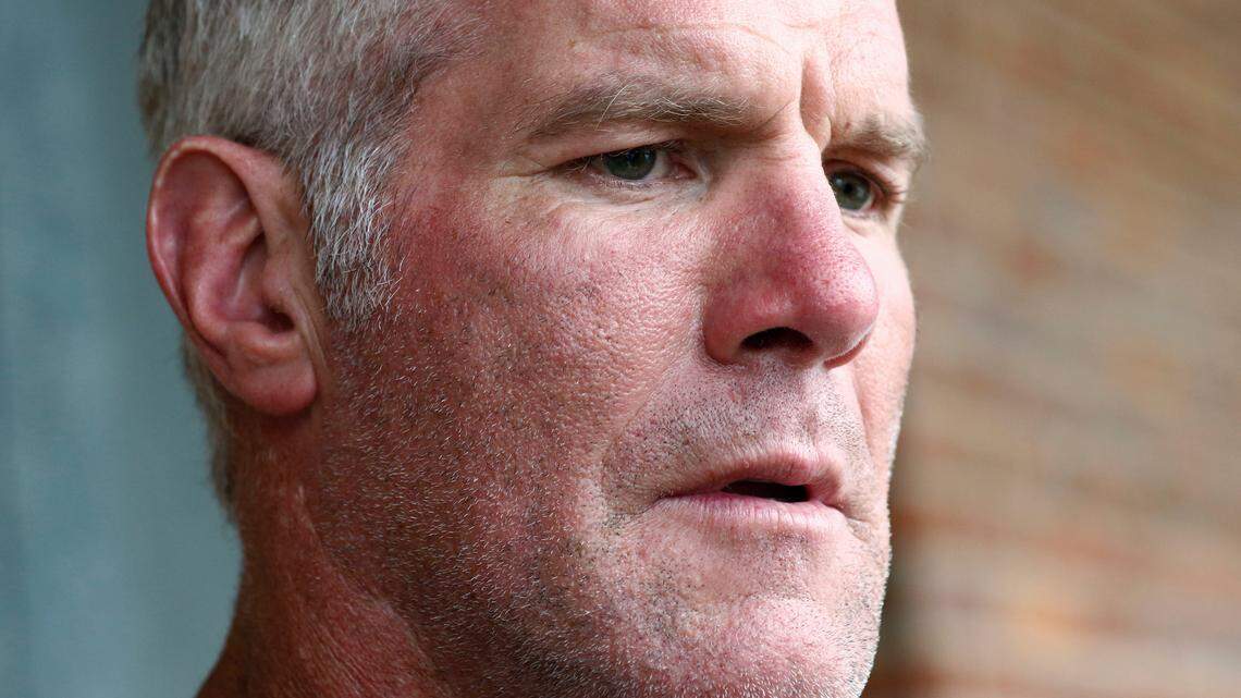 FILE - Former NFL quarterback Brett Favre speaks to the media in Jackson, Miss., Oct. 17, 2018. The governor of Mississippi in 2017 was “on board” with a plan for a nonprofit group to pay Brett Favre more than $1 million in welfare grant money so the retired NFL quarterback could help fund a university volleyball facility, according to a text messages between Favre and the director of the nonprofit in court documents filed Monday, Sept. 12, 2022. (AP Photo/Rogelio V. Solis, File)
