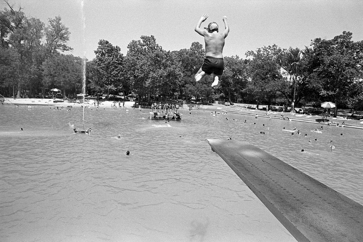 June 25, 1980: A swimmer jumps in off the diving board into Burger’s Lake as Fort Worth reached temperatures over 100 degrees during a heat wave.