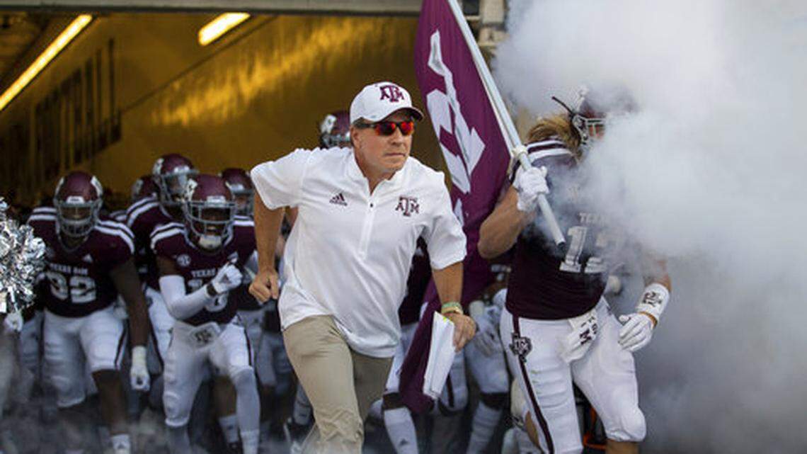 Texas A&M  coach Jimbo Fisher leads the Aggies onto Kyle Field for an NCAA college football game against Northwestern State on Thursday, Aug. 30, 2018, in College Station, Texas. (AP Photo/Sam Craft)