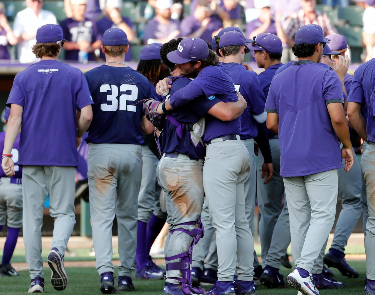 TCU catcher Karson Bowen (14) and pitcher Luke Savage (16) embrace after winning game one of the NCAA Super Regional between TCU and Indiana State at Lupton Stadium in Fort Worth, Texas, Friday June 09, 2023. TCU defeated Indiana State 4-1. (Special to the Star-Telegram Bob Booth)