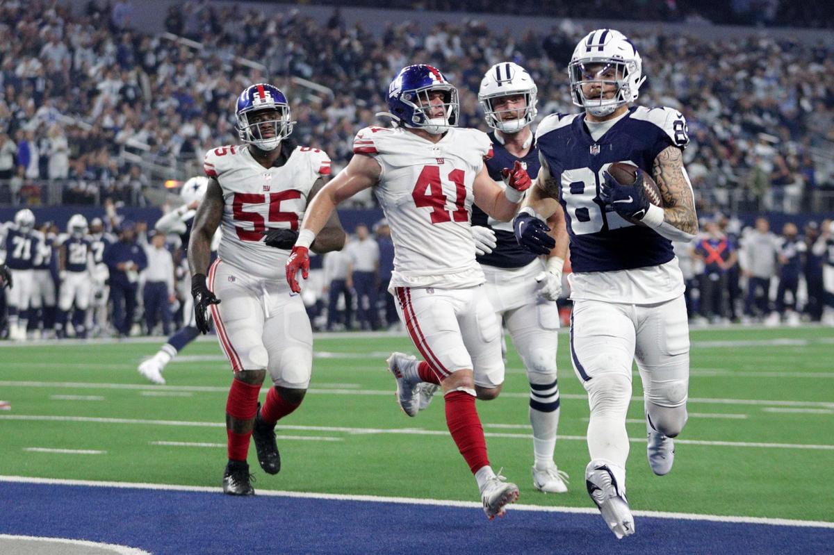 Dallas Cowboys tight end Peyton Hendershot runs in a touchdown during their game against the Giants at the AT&T Stadium in Arlington on Thursday, Nov. 24, 2022.