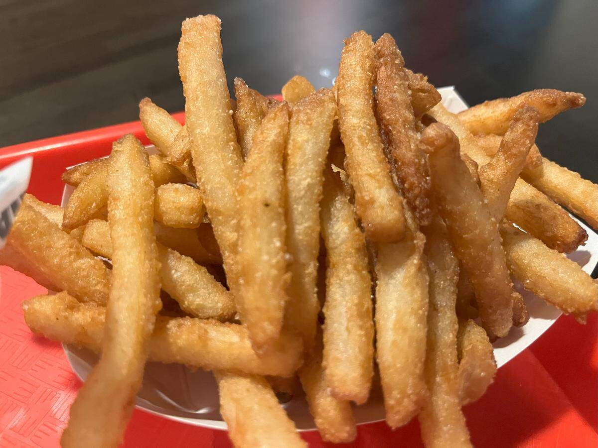 NADC Burger fries are served with chipotle pepper ketchup and secret sauce for $5.