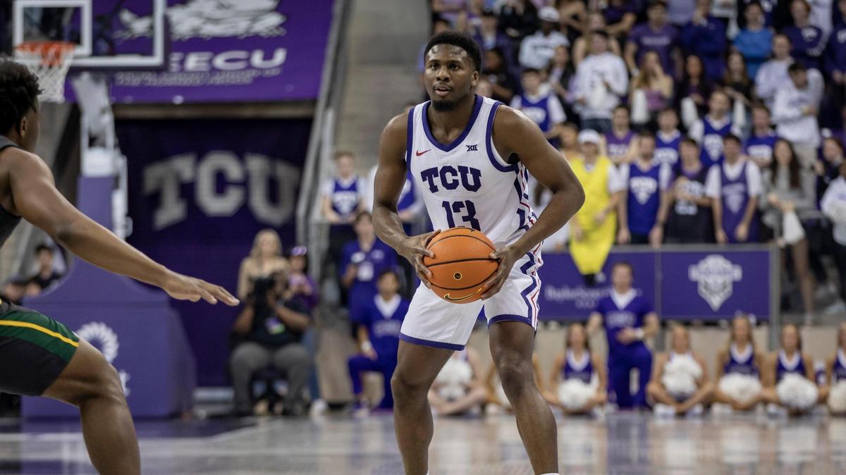 TCU guard Shahada Wells looks to pass during their game against Baylor on Saturday, Feb. 11, 2023, at Schollmaier Arena in Fort Worth.