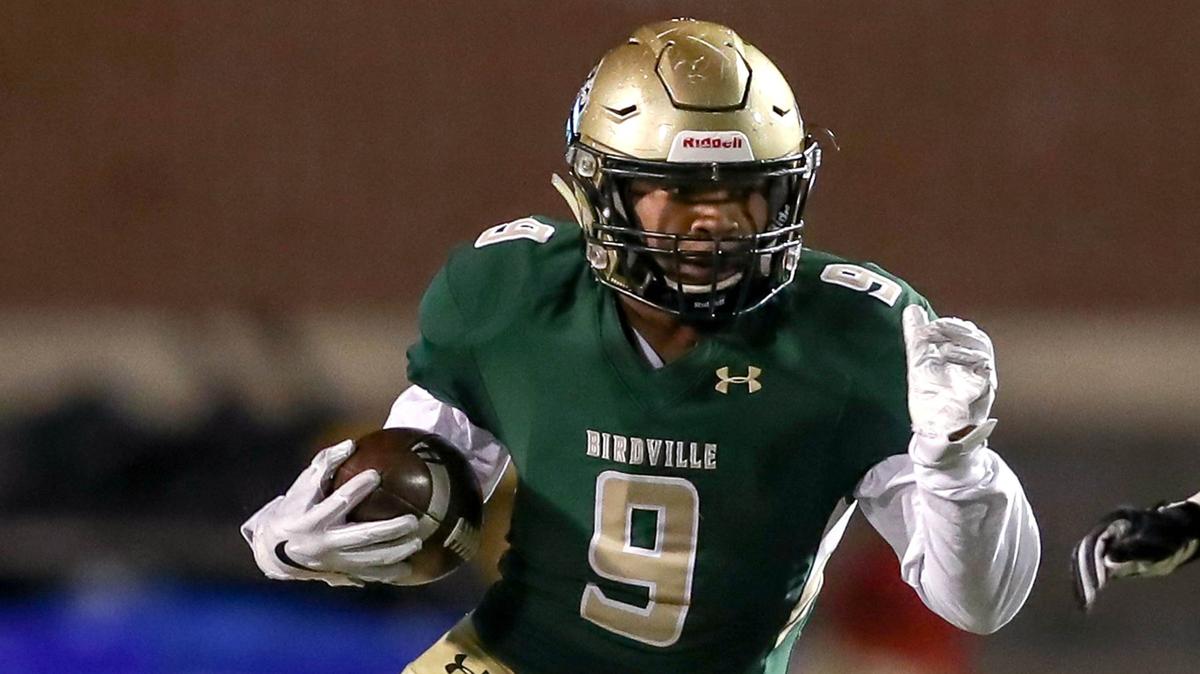 Birdville running back Laderrious Mixon, in action last week, finished with three touchdowns Friday as the Hawks defeated Abilene Cooper 49-14 in a Class 5A Division I area playoff football game.