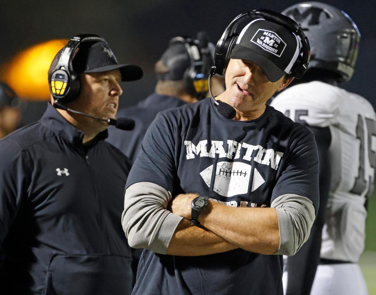Martin head coach Chad Rives talks to his staff upstairs in the second half of a UIL Conference 6A Division 1 area round football playoff game at Dragon Stadium in Southlake Texas, Friday, Nov. 17, 2023. Allen defeated Martin 36-33 in overtime.