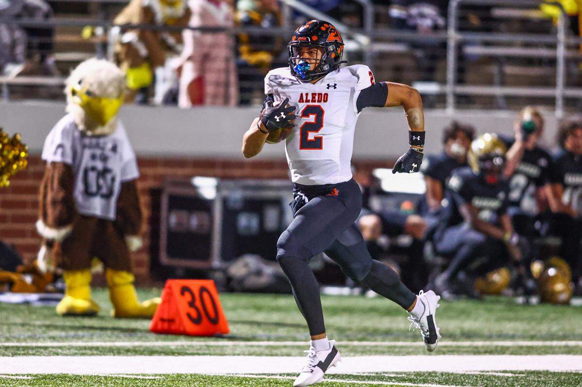 Aledo receiver Kaydon Finley outruns the defense on a 96-yard touchdown reception in the Friday, Nov. 22 playoff game at Newsom Stadium in Mansfield. Special to the Star-Telegram / Tom Marvin