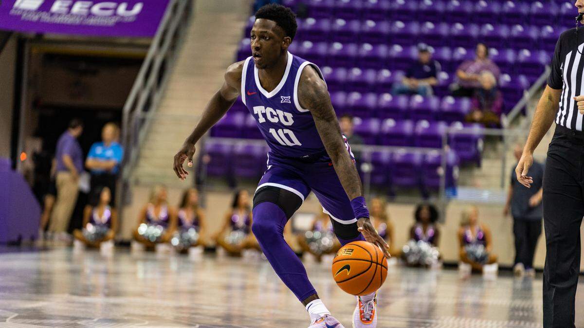 TCU guard Damion Baugh dribbles up the court during TCU’s 112-42 exhibition win over Paul Quinn College on Sunday. Baugh finished with 12 points and seven assists in just under 15 minutes.