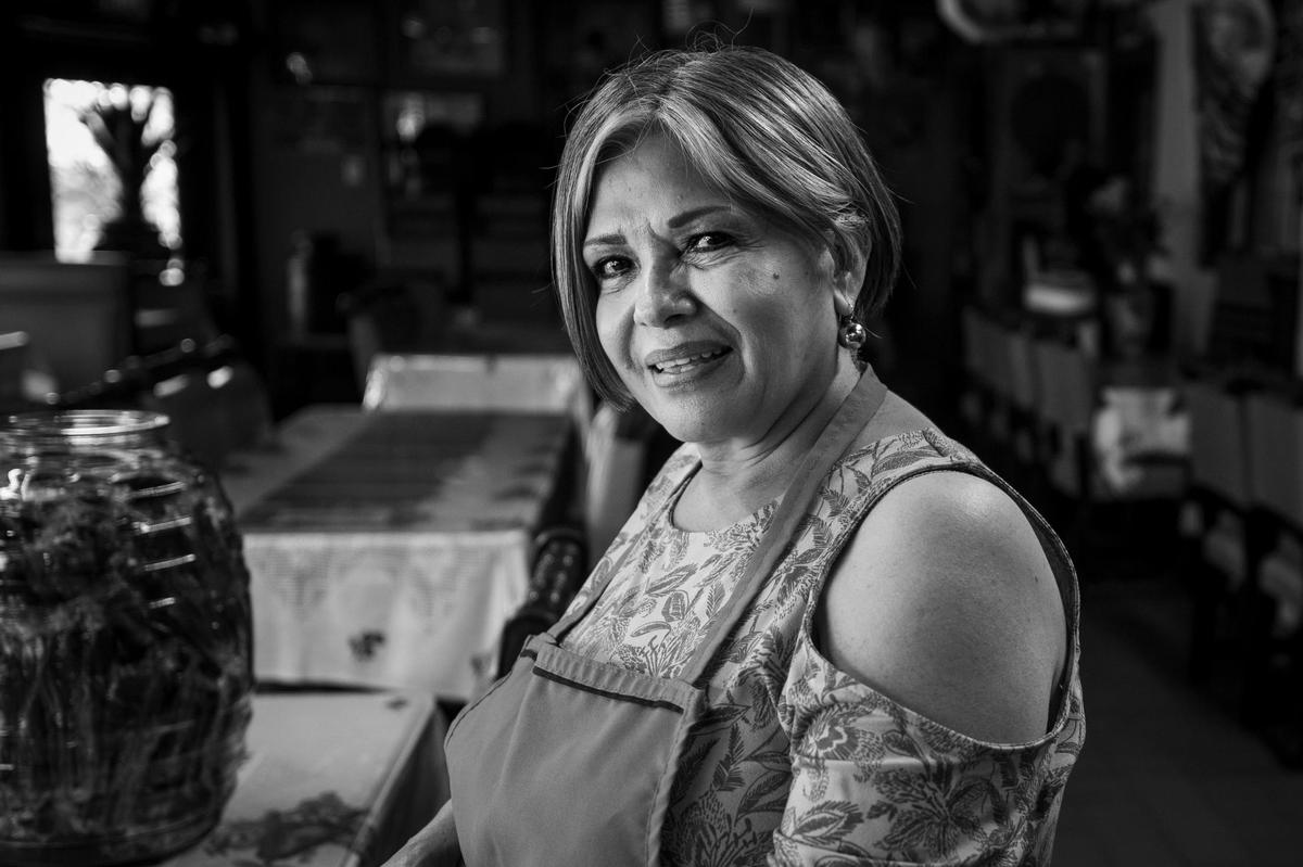 Horalia Palomino has worked at Los Zarapes Restaurant in Fort Worth for 35 years, and had to adjust her work to deal with the coronavirus pandemic.