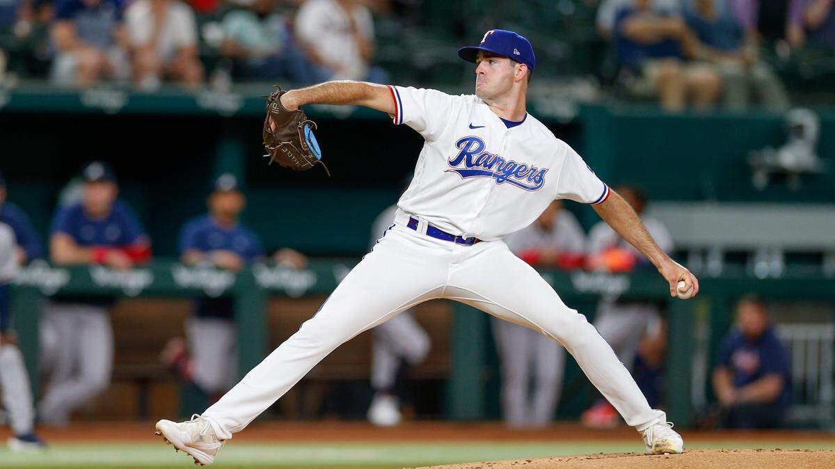 Texas Rangers pitcher Cody Bradford (61) throws during the first inning against the Atlanta Braves at Globe Life Field.