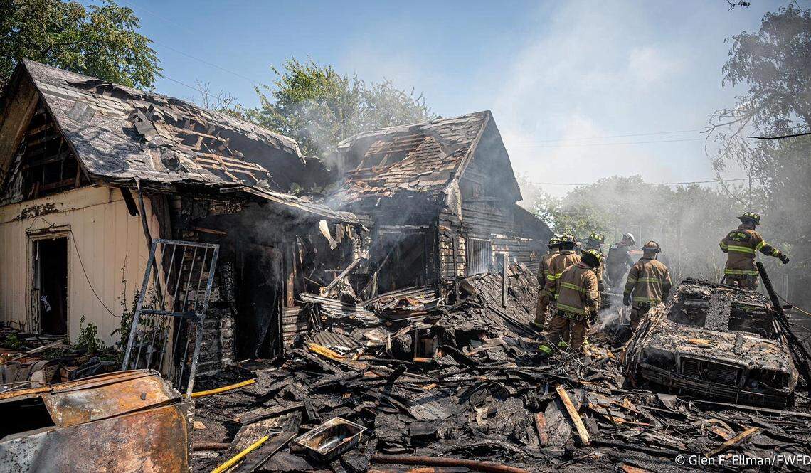 The garage of this house on Williams Street in Fort Worth collapsed during a fire on Wednesday, Sept. 3, briefly trapping Firefighter Caleb Halvorson, who was flown to Parkland Hospital in Dallas to be treated for burns and other injuries.