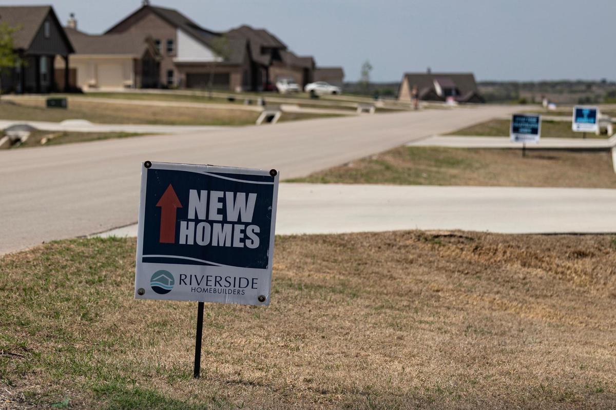 The Hillcrest Meadows North neighborhood puts out signs indicating new homes near Decatur on Saturday, March 29, 2025.