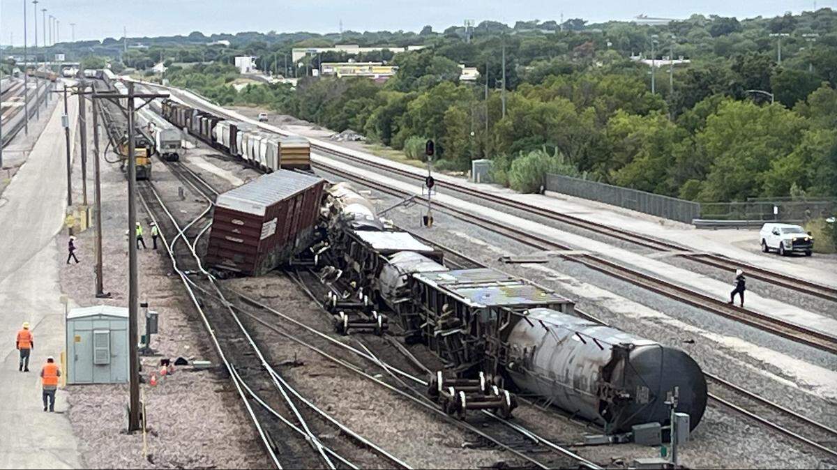 Fort Worth firefighters respond to a train derailment at the Davidson rail yard on West Vickery Boulevard on Sunday morning, Aug. 31.