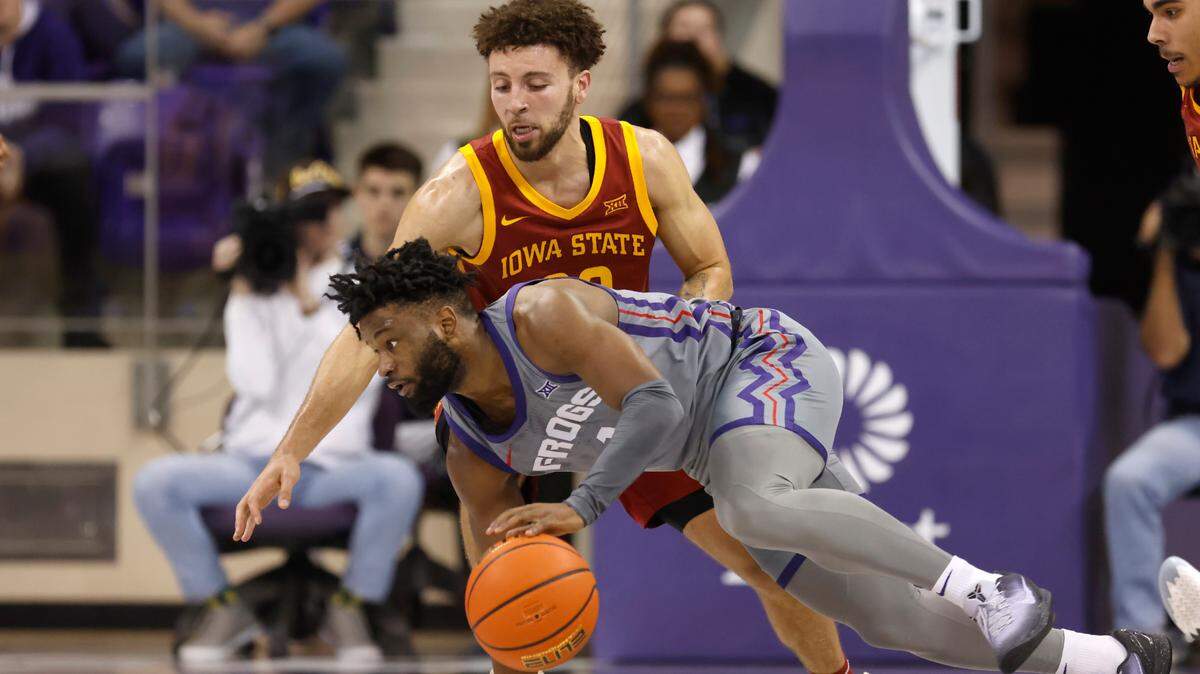 TCU guard Mike Miles Jr. (1) handles the ball as Iowa State guard Gabe Kalscheur (22) defends during the second half of an NCAA college basketball game on Jan. 7.
