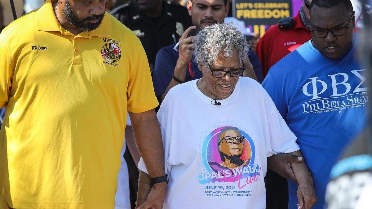 Opal Lee, 94, walks towards downtown Fort Worth from Evans Avenue Plaza during the first federal Juneteenth holiday on June 19. Lee made the 2.5-mile walk to symbolize the two and a half years it took for slaves in Texas to realize they had been freed.