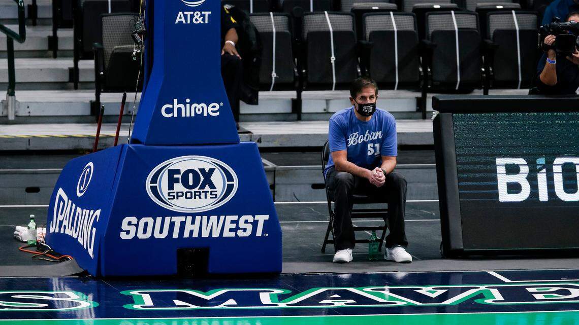 Dallas Mavericks owner Mark Cuban watches during the first half of the Dallas Mavericks’ 118-99 loss to the Charlotte Hornets on Dec. 30, 2020. Monday night’s Mavs game against the New Orleans Hornets was postponed because of COVID concerns.