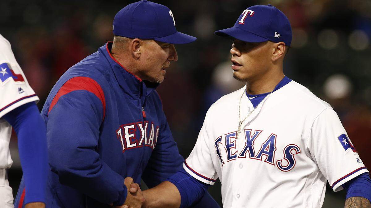 Rangers manager Jeff Banister, left, said that he is proud of the growth process displayed by closer Keone Kela.