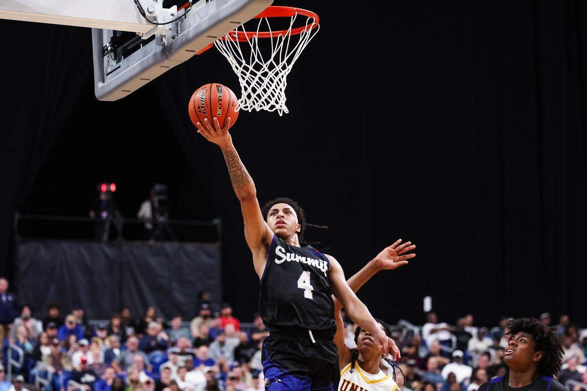 Mansfield Summit guard Jaxon Sneed goes up for a layup during the Class 5A Division II state championship game Saturday at the Alamodome in San Antonio.