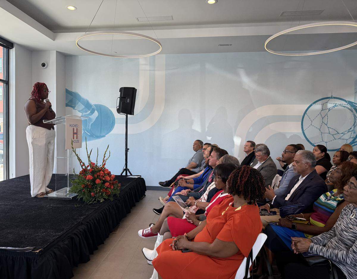 Hughes House resident Erika Marshall spoke to the audience about how much the new development has meant to her and her daughters, and the importance of having a nice and safe environment.