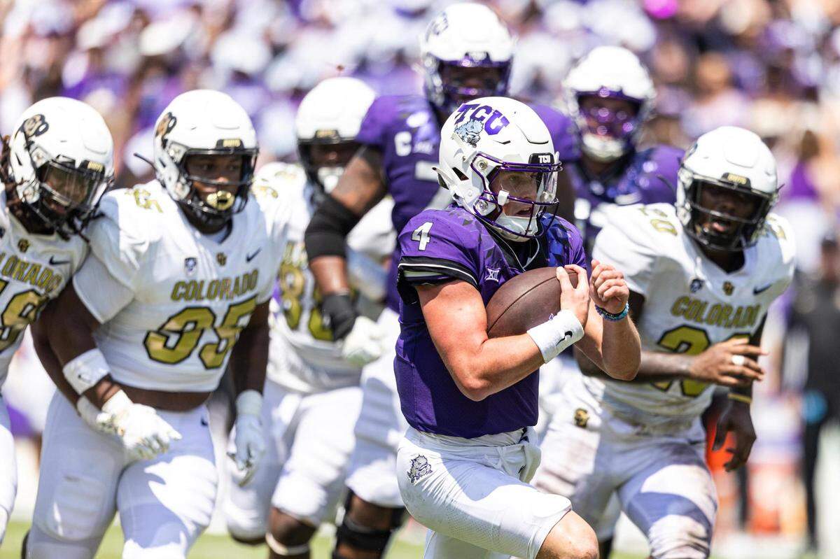 TCU quarterback Chandler Morris (4) runs the ball in the end zone in the fourth quarter of a college football game between the TCU Horned Frogs and the Colorado Buffaloes at Amon G. Carter Stadium in Fort Worth on Saturday, Sept. 2, 2023.
