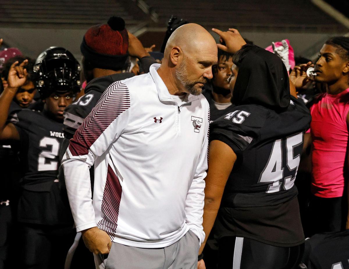 Timberview head coach Robby Desanto walks away from players after his post game talk after a UIL football game at Vernon Newsom Stadium in Mansfield, Texas, Thursday, Oct. 19, 2023.