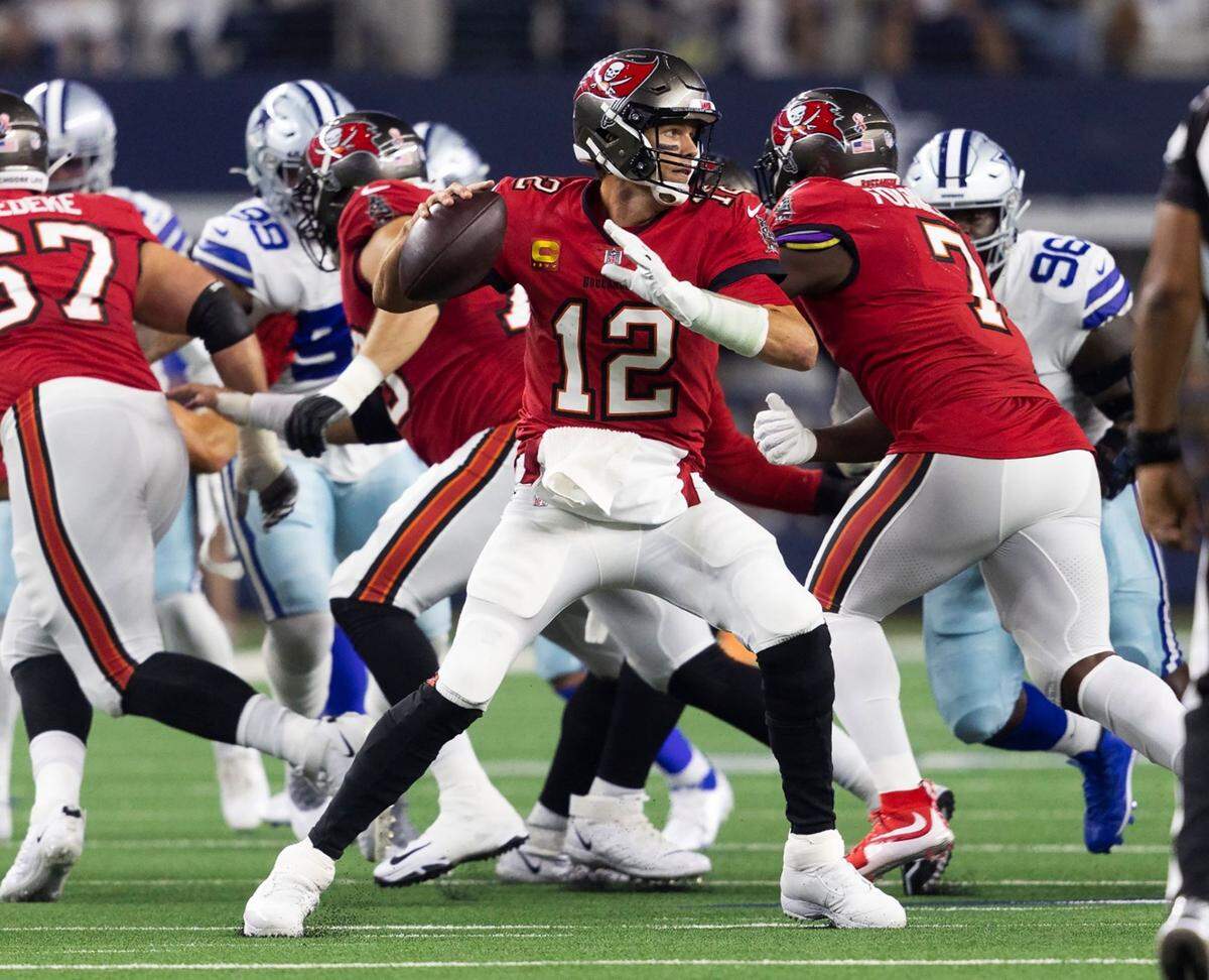 Tampa Bay Buccaneers quarterback Tom Brady throws the ball during the 2022 season opener against the Tampa Bay Buccaneers on Sunday, September 11, 2022, at AT&T Stadium in Arlington.