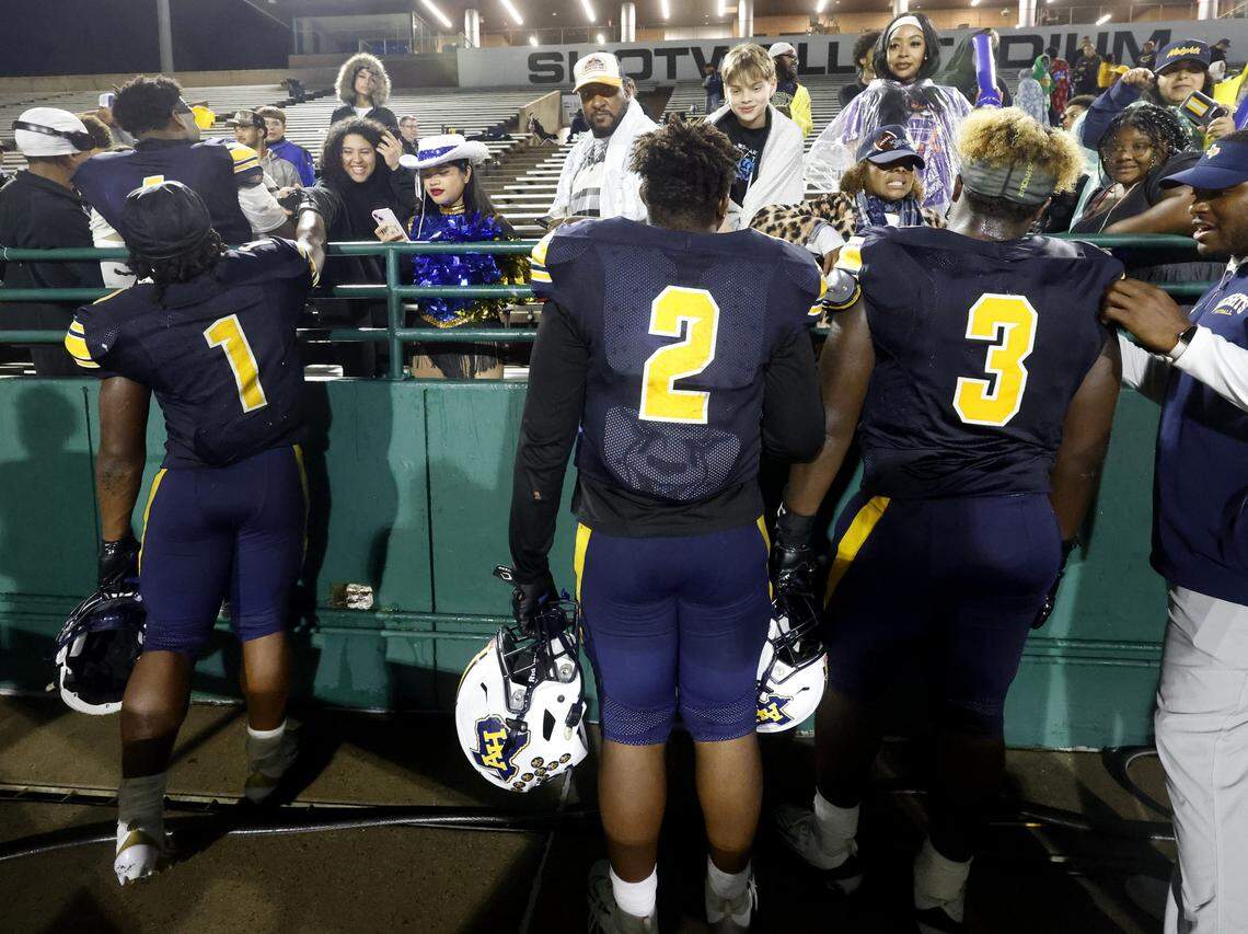 Fort Worth Arlington Heights running back Carson James (1), defensive linemen Carter James (2) and Caynan James (3) visit with fans after the UIL Class 5A DI area-round football playoff game against Lubbock Monterey Thursday Nov. 20, 2025 at Shotwell Stadium in Abilene, Texas.