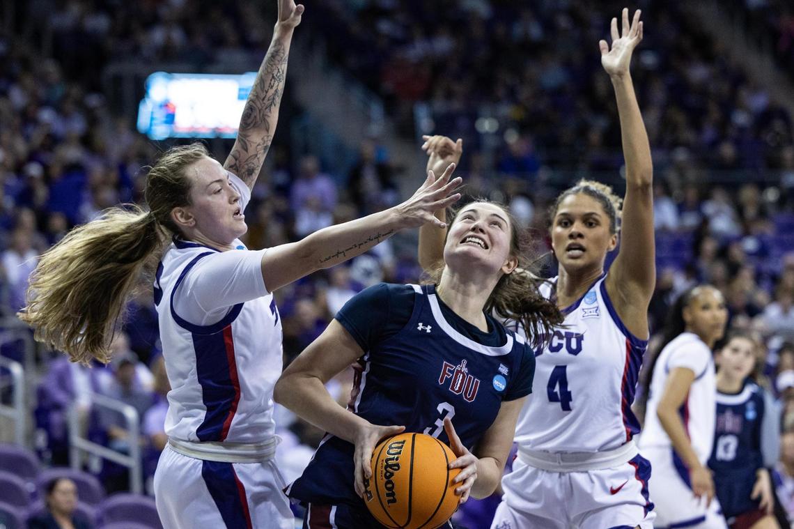TCU guards Madison Conner (3) and Donovyn Hunter (4) double team Fairleigh Dickinson forward Bella Toomey (3) in the first half of the first round of the Women’s NCAA Championships Tournament game between TCU and Fairleigh Dickinson at Schollmaier Arena in Fort Worth on Friday, March 21, 2025.