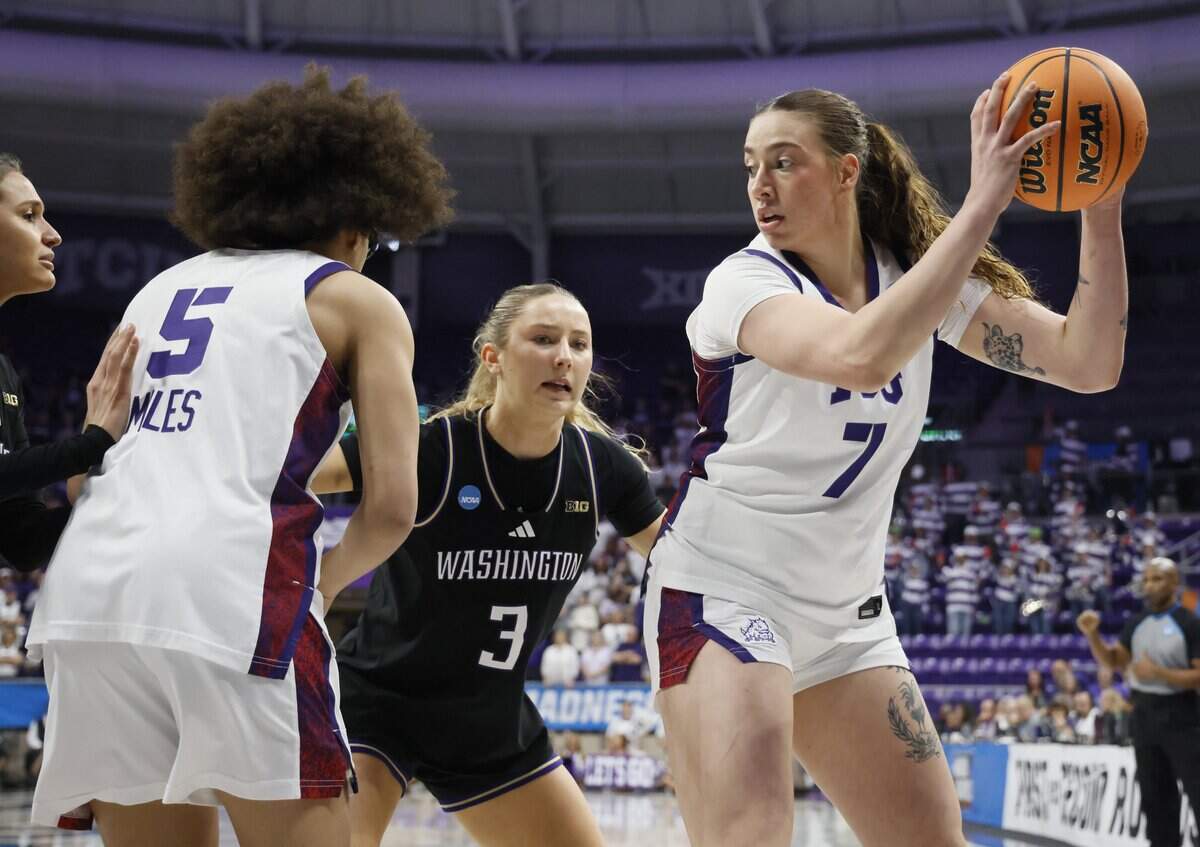 TCU forward Marta Suarez (7) attempts to get the ball away from Washington guard Devin Coppinger (3) during the first half of a second round NCAA Division I Women's Basketball Championship game at Schollmeier Arena in Fort Worth, Texas, Sunday, March, 22, 2026.