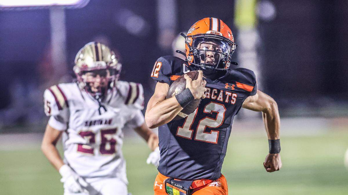 Aledo quarterback Lincoln Tubbs (12) has a long run late in the second quarter against Saginaw in a Class 5A Division I bi-district playoff game on Thursday, November 13, 2025 at Tim Buchanan Stadium in Aledo, Texas.
