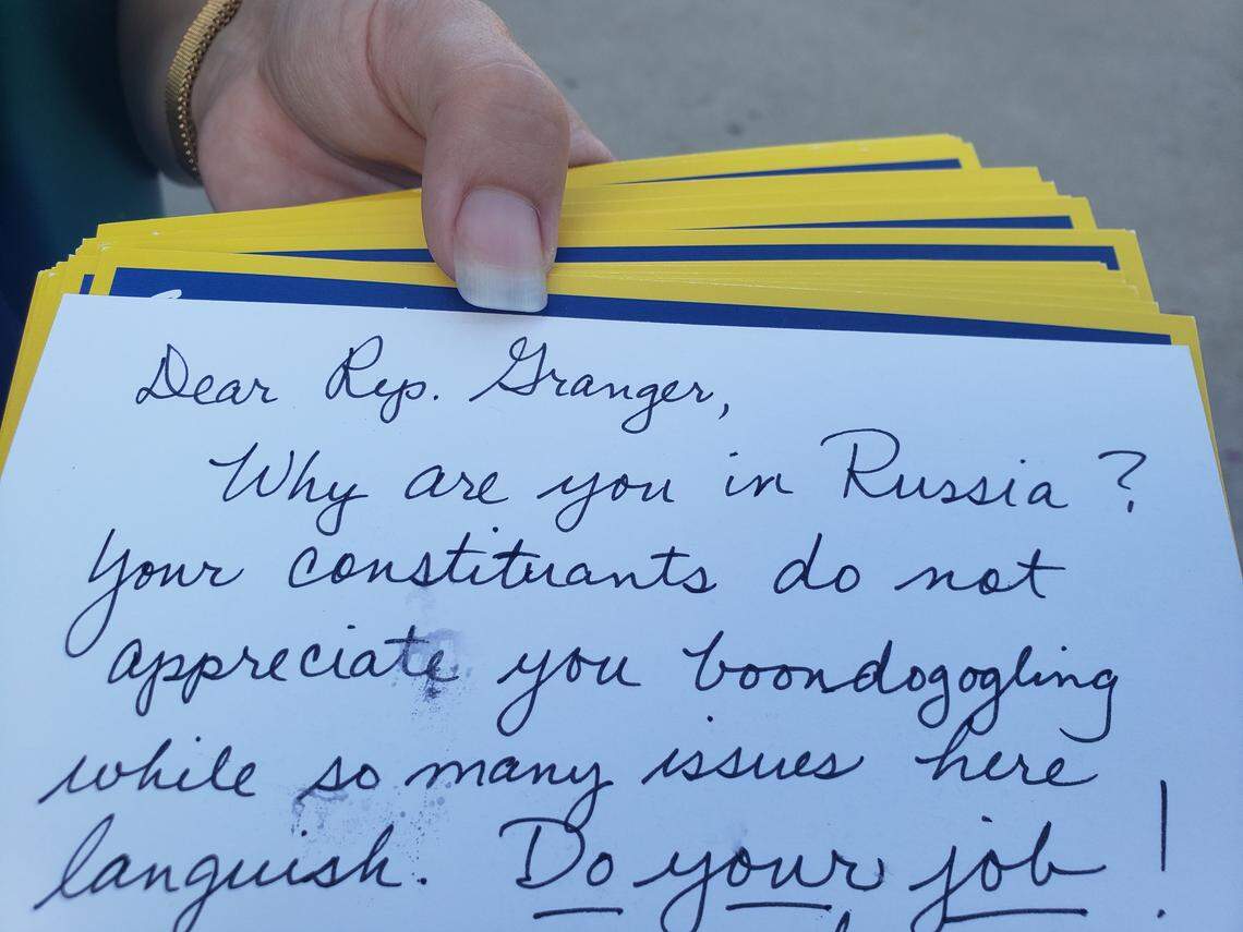 U.S. Rep. Kay Granger's recent trip to Russia inspired a protest via postcards. More than 150 postcards were delivered to her Fort Worth office on Friday during a weekly protest against family separation of immigrants.