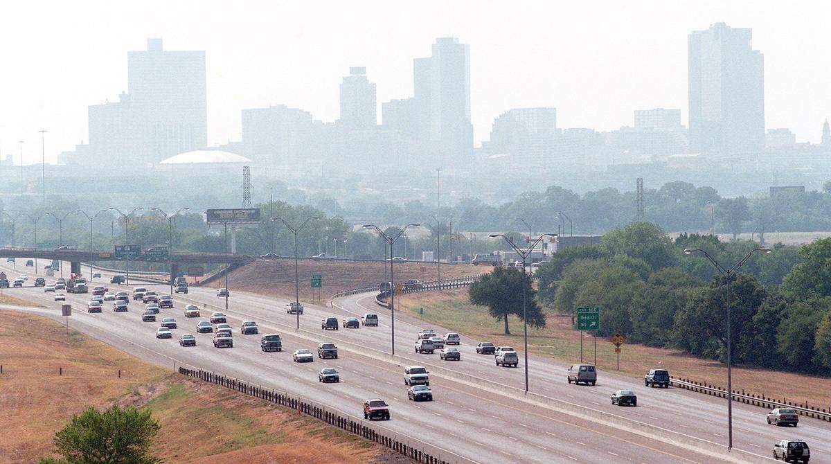 Aug. 30, 1999: Haze shrouds downtown Fort Worth as viewed from Interstate 30 east of downtown between Beach Street and Oakland Boulevard.
