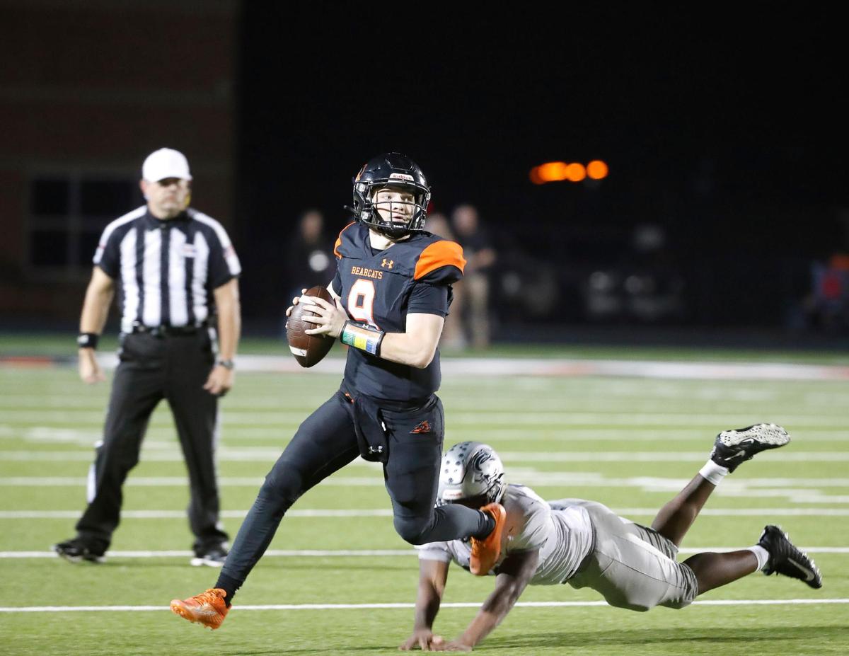 Aledo quarterback Brant Hayden (9) is chased out of the pocket and throws the ball away in the second half of a Class 5A D1 bi-district football game between Killeen Shoemaker and Aledo at Bearcat Stadium in Aledo, Texas, Thursday, Nov. 10, 2022. The Aledo Bearcats shut out Shoemaker to advance in the playoffs. (Special to the Star-Telegram Bob Booth)