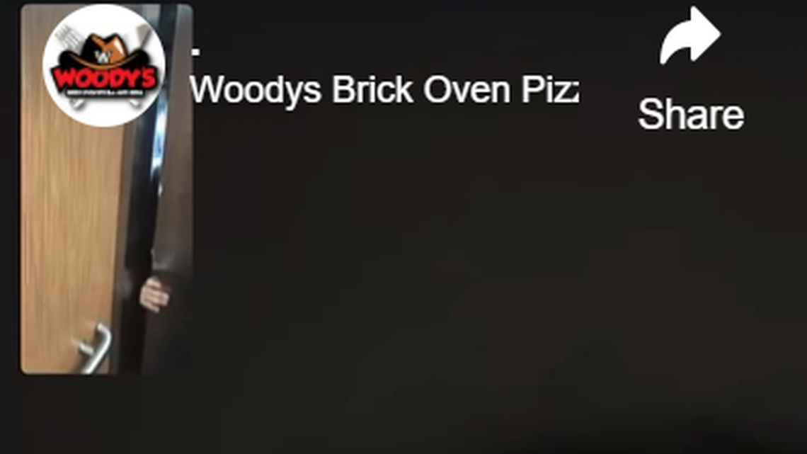 Woody’s Brick Oven Pizza and Grill says a delivery driver fell seven floors in a broken elevator.