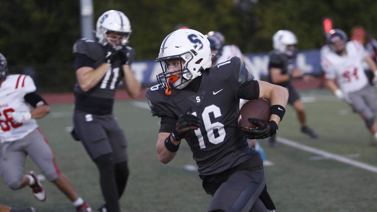 All Saints Episcopal’s Jaytn Briles picks up yardage against Grapevine Faith during their game at All Saints Episcopal on Friday, Oct. 10, 2025.