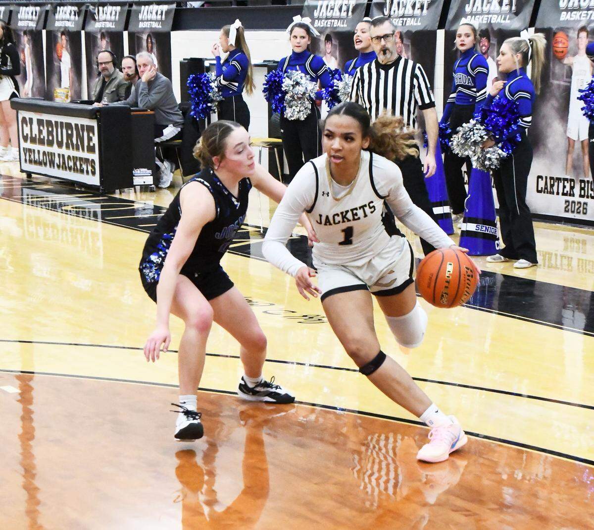 Cleburne’s Lily Sheppard drives to the basket against Joshua in a District 8-5A game Jan. 30 at Cleburne.