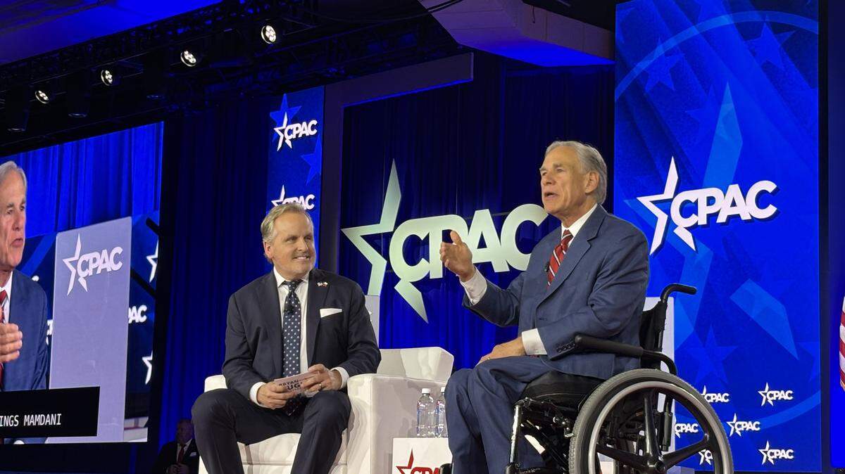 Texas Gov. Greg Abbott and state Sen. Bryan Hughes speak at CPAC in Grapevine on March 27.