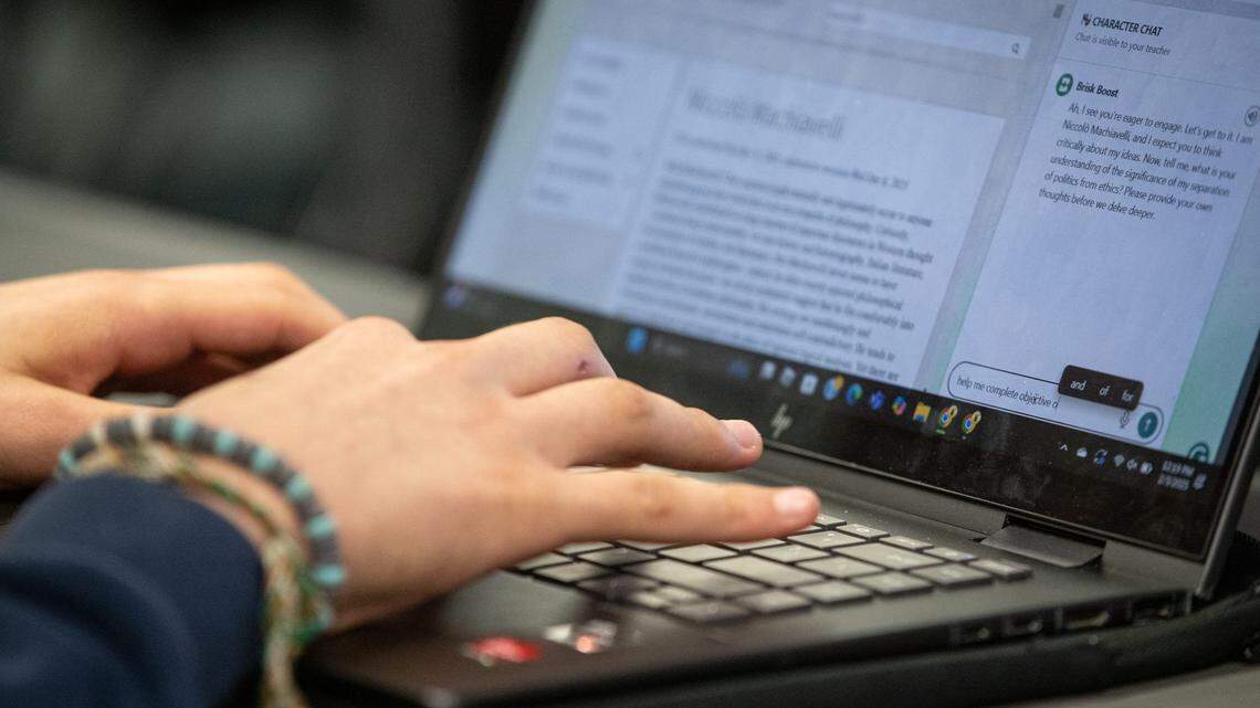 Osiel Salazar responds to an artificial intelligence prompt for an assignment during a 10th grade English class at Collegiate High School on Feb. 3, 2025, in Corpus Christi, Texas.