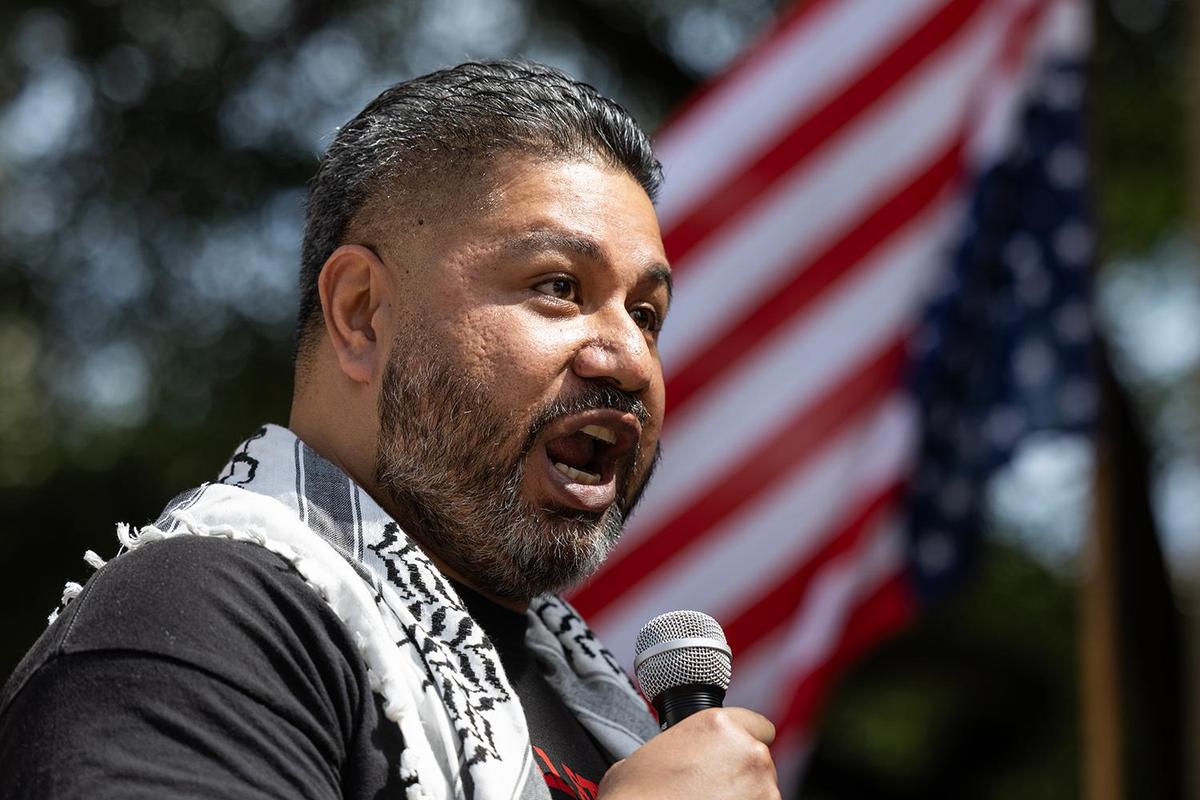 Tevita Uhatafe, the Vice President of the Tarrant County Central Labor Council, speaks to the crowd gathered for the Fort Worth May Day 2025 Rally in Solidarity With Federal Workers at the old City Hall building in downtown Fort Worth on Thursday, May 1, 2025.