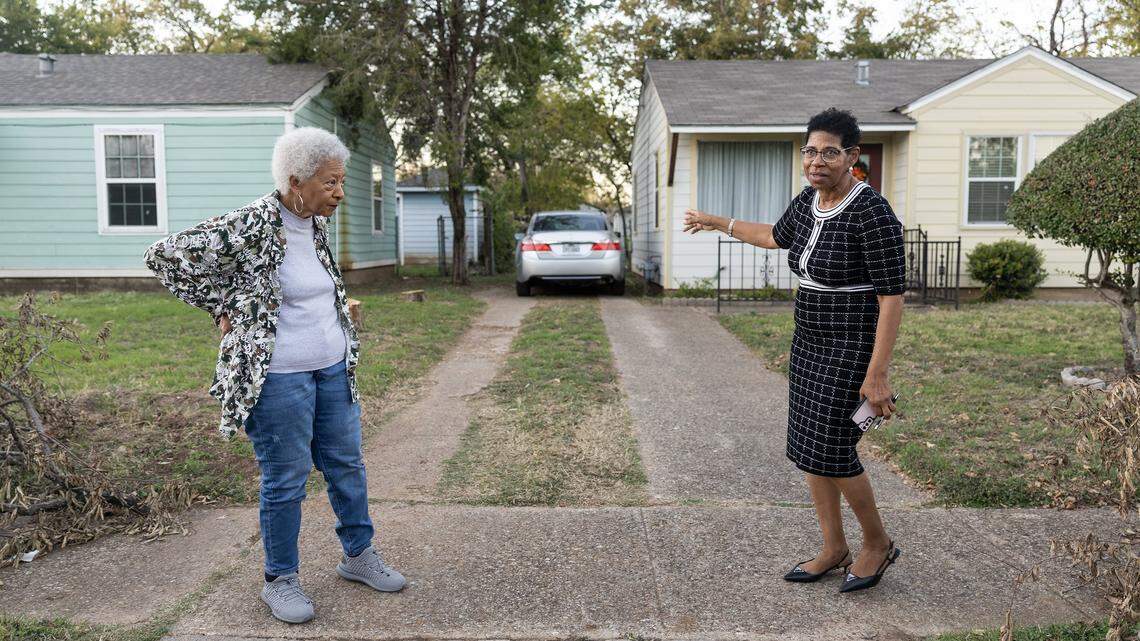 Barbra Smith, left, and Laverne Walker, the Vice president and President of the New Mitchell Boulevard Neighborhood Association, are photographed in front of their houses in Fort Worth on Thursday, Nov, 13, 2025. The New Mitchell Boulevard neighborhood is a recipient of the 2026 Neighborhood Improvement Program. The program targets city funds to help neighborhoods struggling with public safety, poor streets, and residents struggling with poverty.