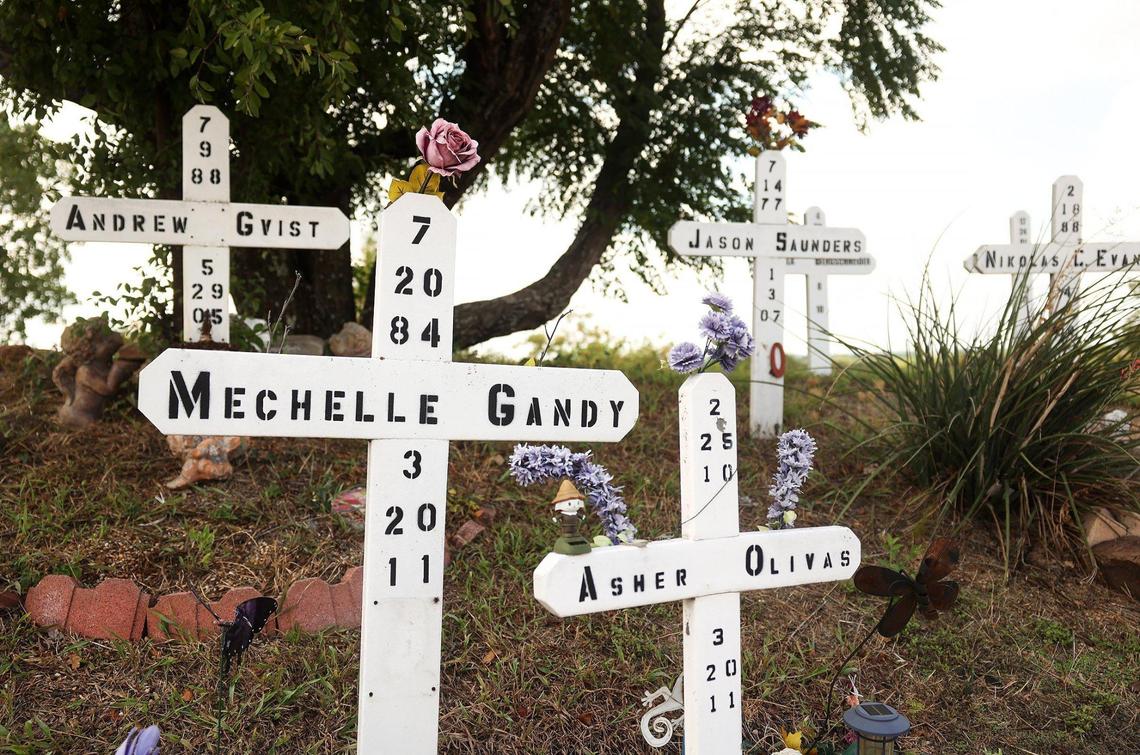 Crosses remembering Mechelle Gandy and her son, Asher, stand in the Garden of Angels memorial in Arlington. They were brutally murdered in 2011. Thomas Olivas was convicted of the crime and sent to prison for life.