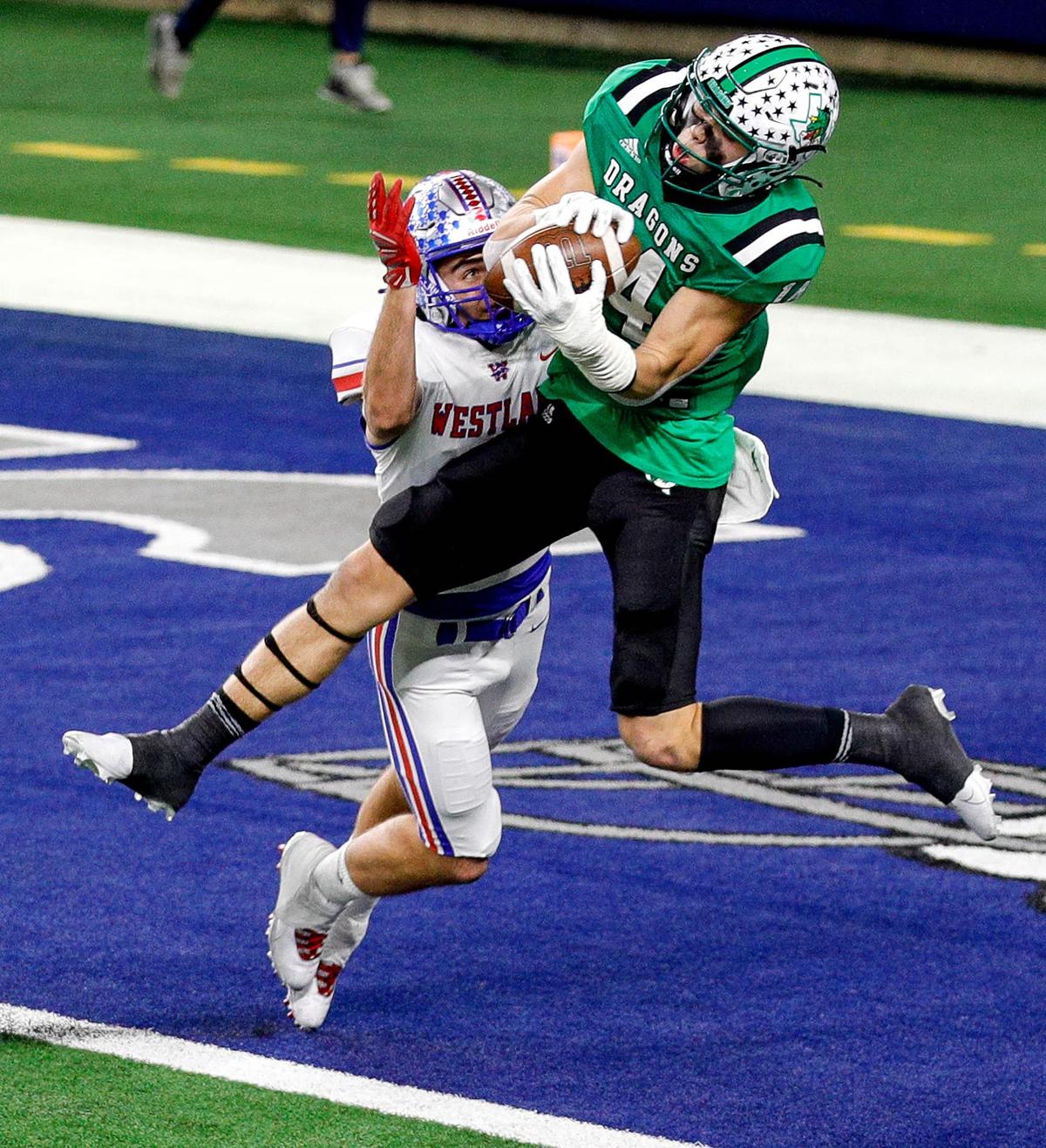 Southlake Carroll receiver Brady Boyd (14) comes up with 27 yard touchdown reception against Austin Westlake during the first half of the 6A Division 1 High School State Championship football playoff game, January 16, 2021 played at AT&T Stadium in Arlington, Tx. (Steve Nurenberg Special to the Star-Telegram)