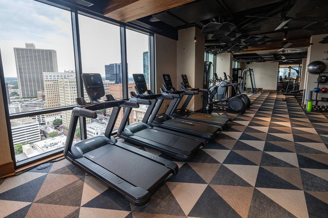 The gym looking out to the downtown skyline on the 24th floor of the new Deco 969 High-Rise Apartments in downtown Fort Worth on Wednesday, July 17, 2024.