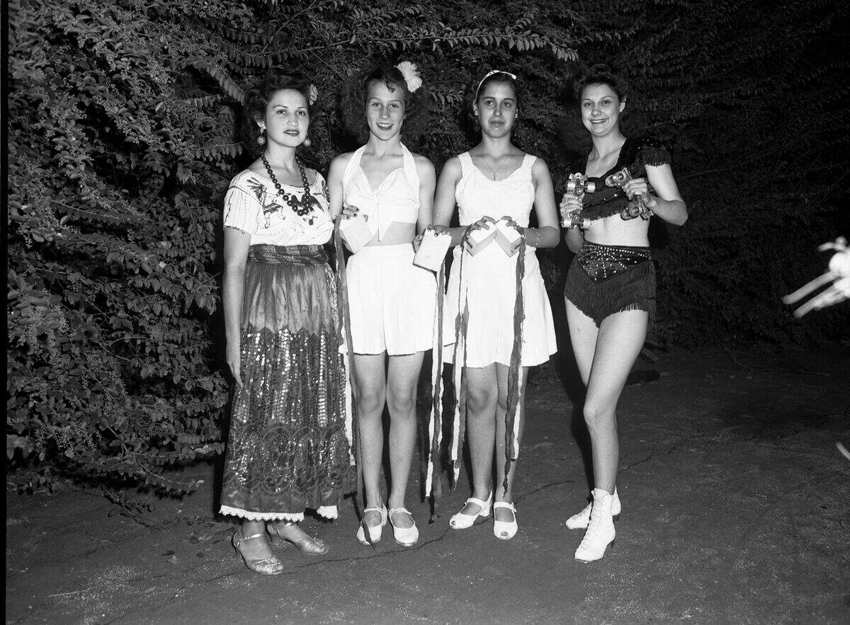 Sept. 3, 1940: Left to right, Berta Buerrero, Patsy Jean Clark and Doris Ann McCormick and Dorothy Carson. The ladies are shown waiting to do their turns in the Labor Day variety show at Sycamore Park. Miss Buerrero is an exponent of the Mexican folk dance, Misses Clark and McCormick are two of the troupe of dancers who performed a block dance, and Miss Carson did a roller skating specialty.