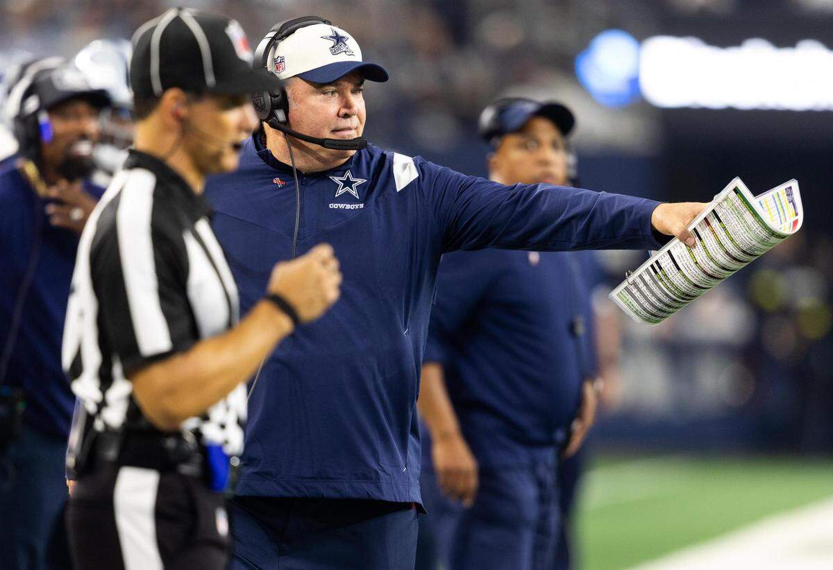 Dallas Cowboys head coach Mike McCarthy talks to a referee during the first half of the game against Tampa Bay Buccaneers Sunday, Sept. 11, 2022, at AT&T Stadium in Arlington.