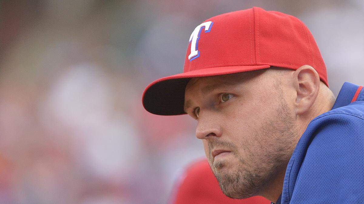 Matt Harrison had to give up baseball because of a back injury that reminds him each morning why he can no longer play.