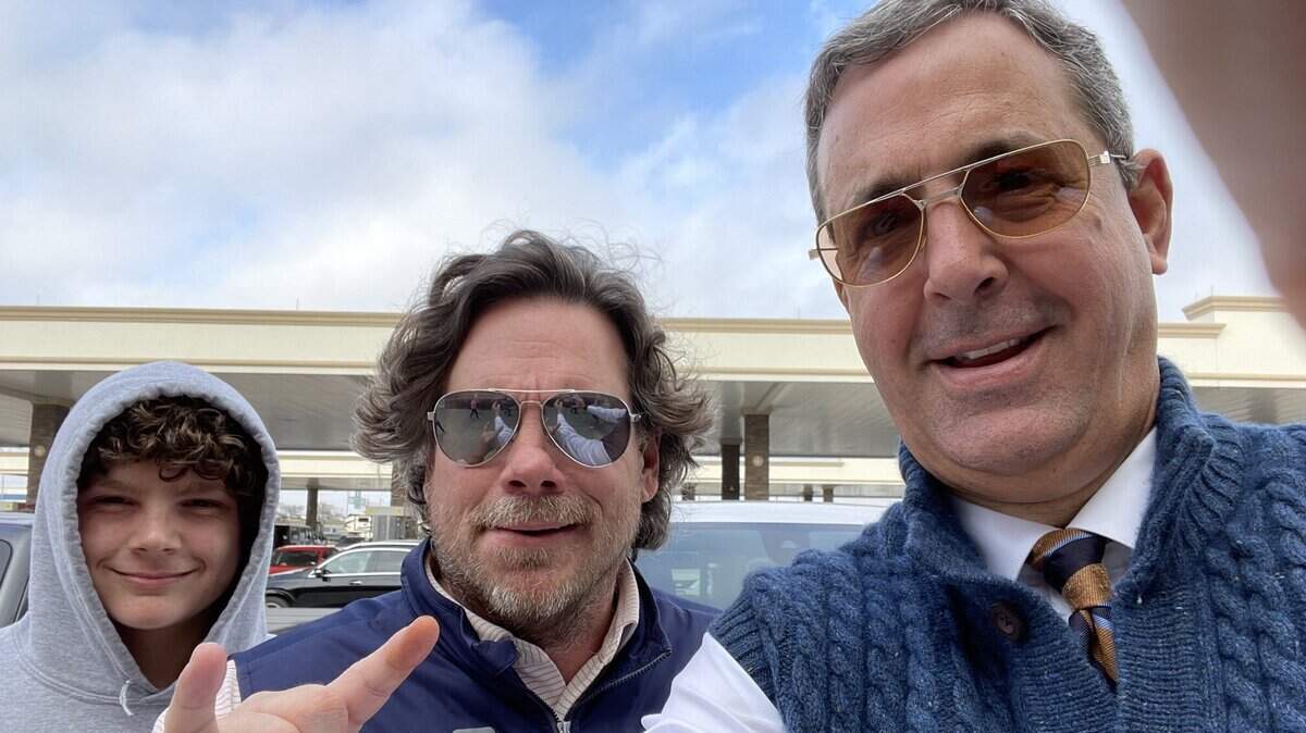 University of Texas athletic director Chris Del Conte, right, decided to drive to Milwaukee from Austin on Thursday after his flight was delayed multiple times. Del Conte met two Longhorns fans, Hodges and dad Wheels Smith, middle, at the airport. Del Conte chronicled the road trip with a series of social media posts, including images from Oklahoma, St. Louis, and Illinois.