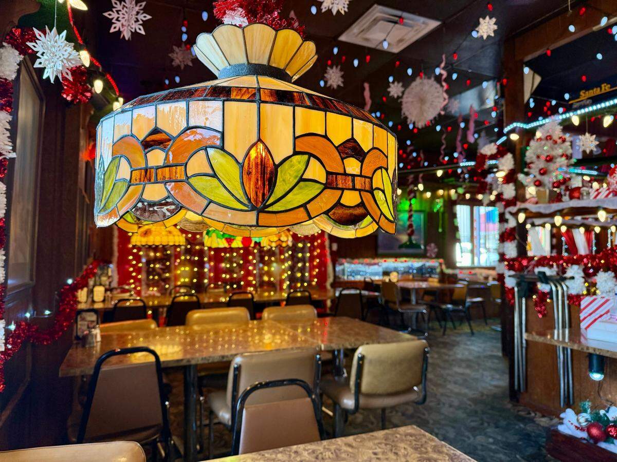 The dining room at Campo Verde restaurant in Dalworthington Gardens still has its old-time lamps along with updated Christmas decor, as seen Oct. 15, 2024.