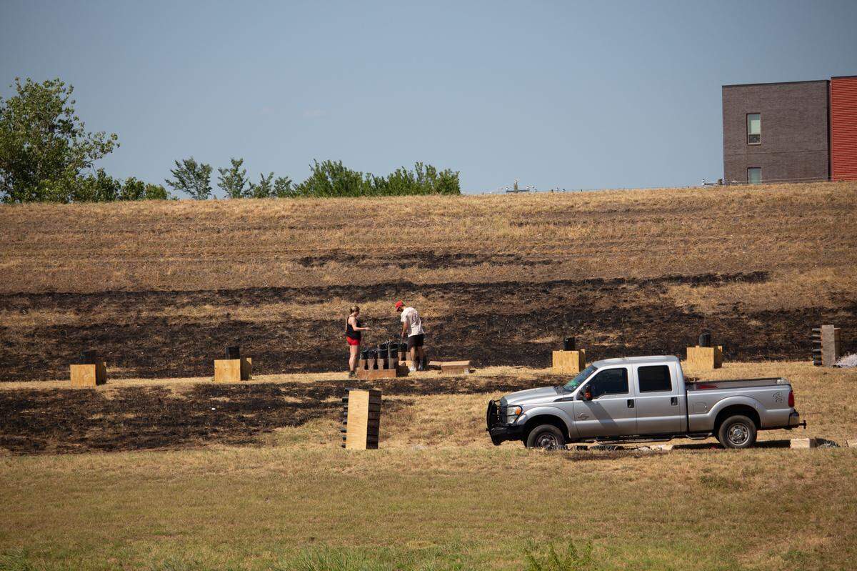On Monday night, the Fort Worth’s Fourth fireworks event at Panther Island Pavilion was stopped when several grass fires sparked minutes after the show began. Workers were cleaning up in the area on Tuesday.