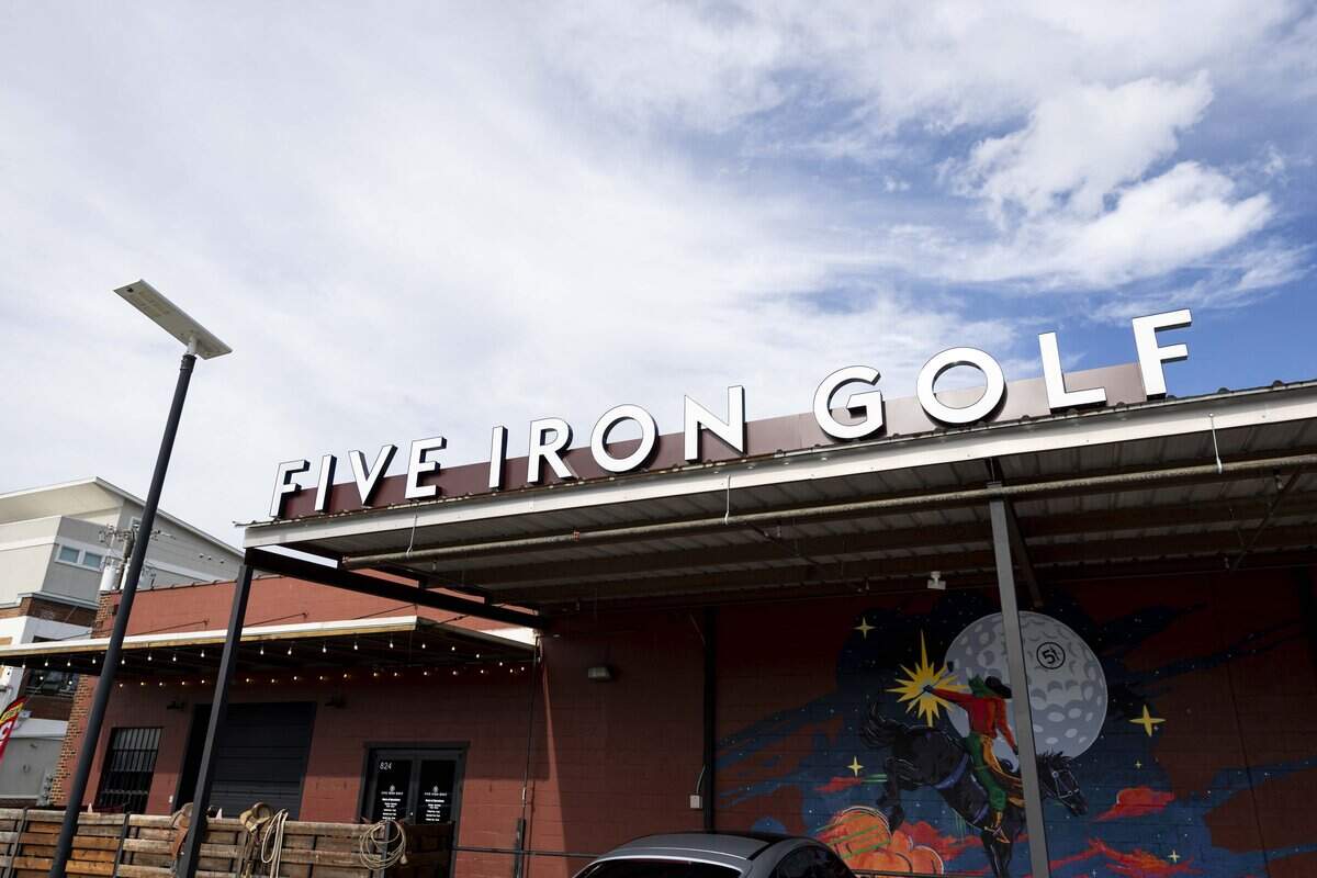 Five Iron Golf celebrates its grand opening at 824 W. Daggett Ave. on Thursday, June 11, 2026 in Fort Worth. Five Iron Golf offers golf simulation, a full-service bar, food menu and other games for entertainment.