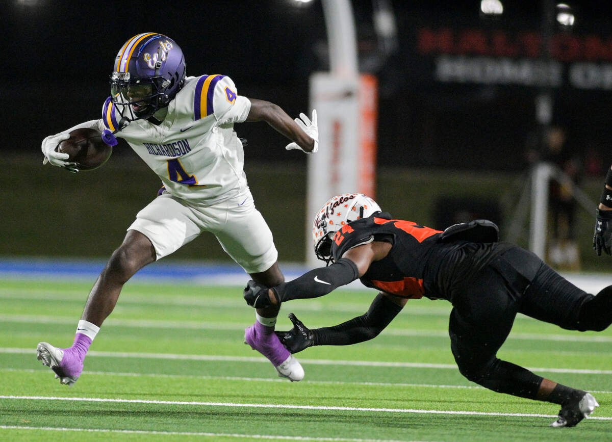 Richardson wide receiver Dameon Crowe (4) avoids a tackle by Haltom defensive back Andre Rich (24) during a UIL bi-district playoff football game against Haltom at Birdville ISD Fine Arts/ Athletic Complex in North Richland Hills, Texas on Friday, Nov. 15, 2024.